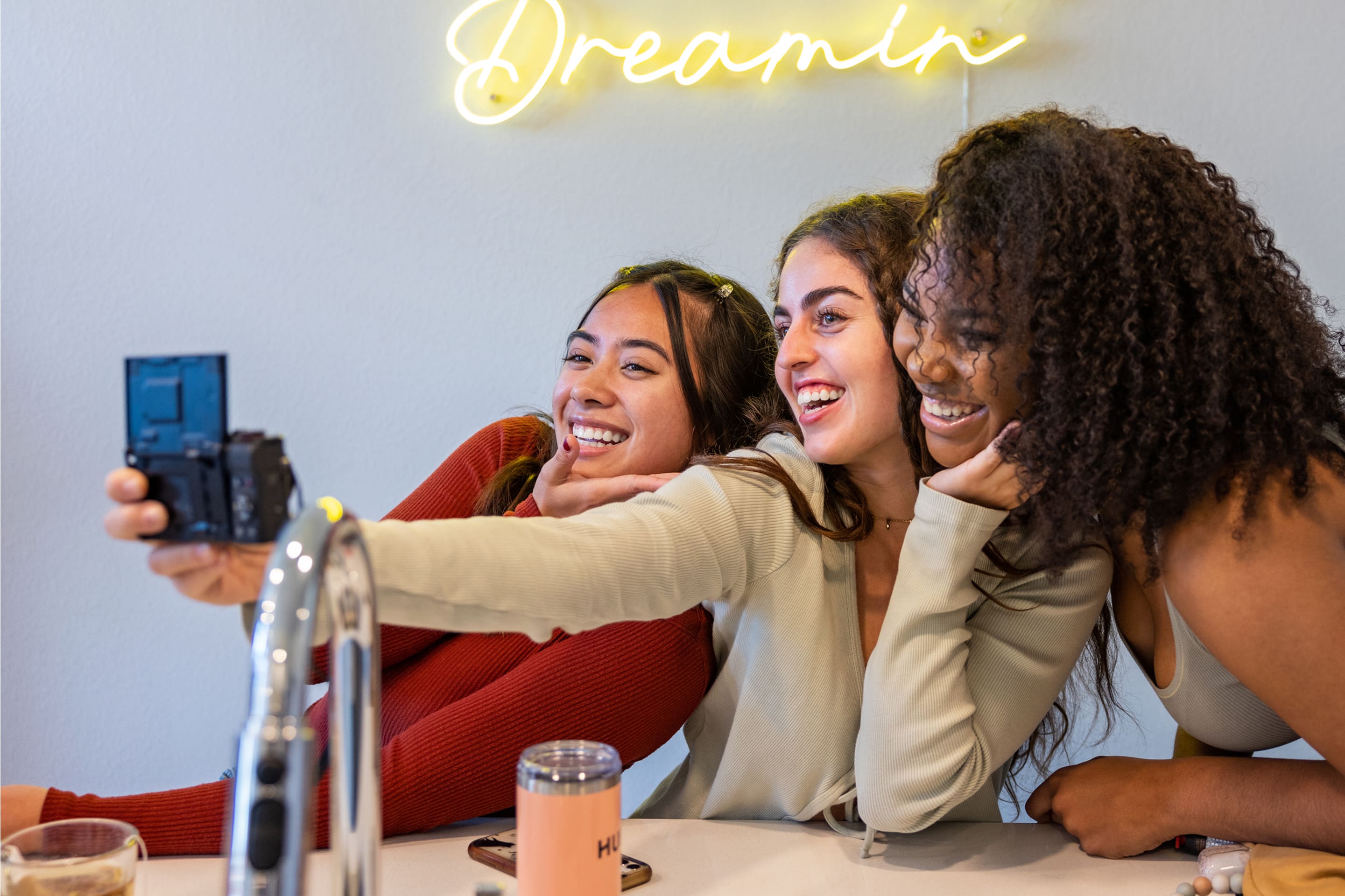group of young women taking a selfing