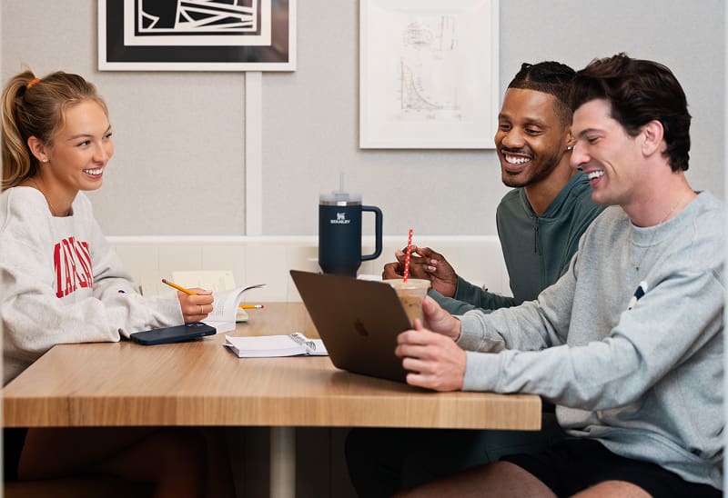 group of young adults studying